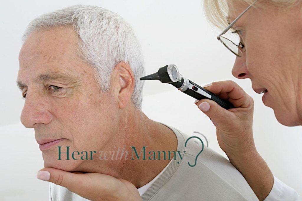 doctor checking a patients ear