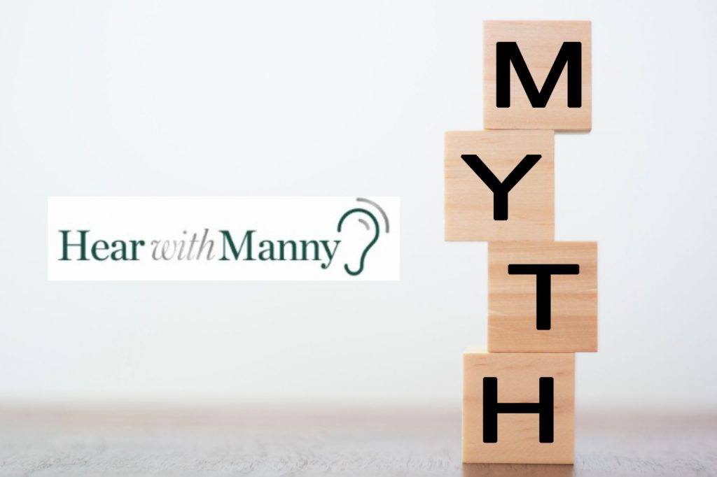 a stack of wooden blocks spelling the word myth