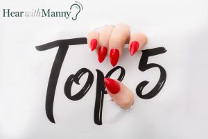 a hand holding the words top 5
